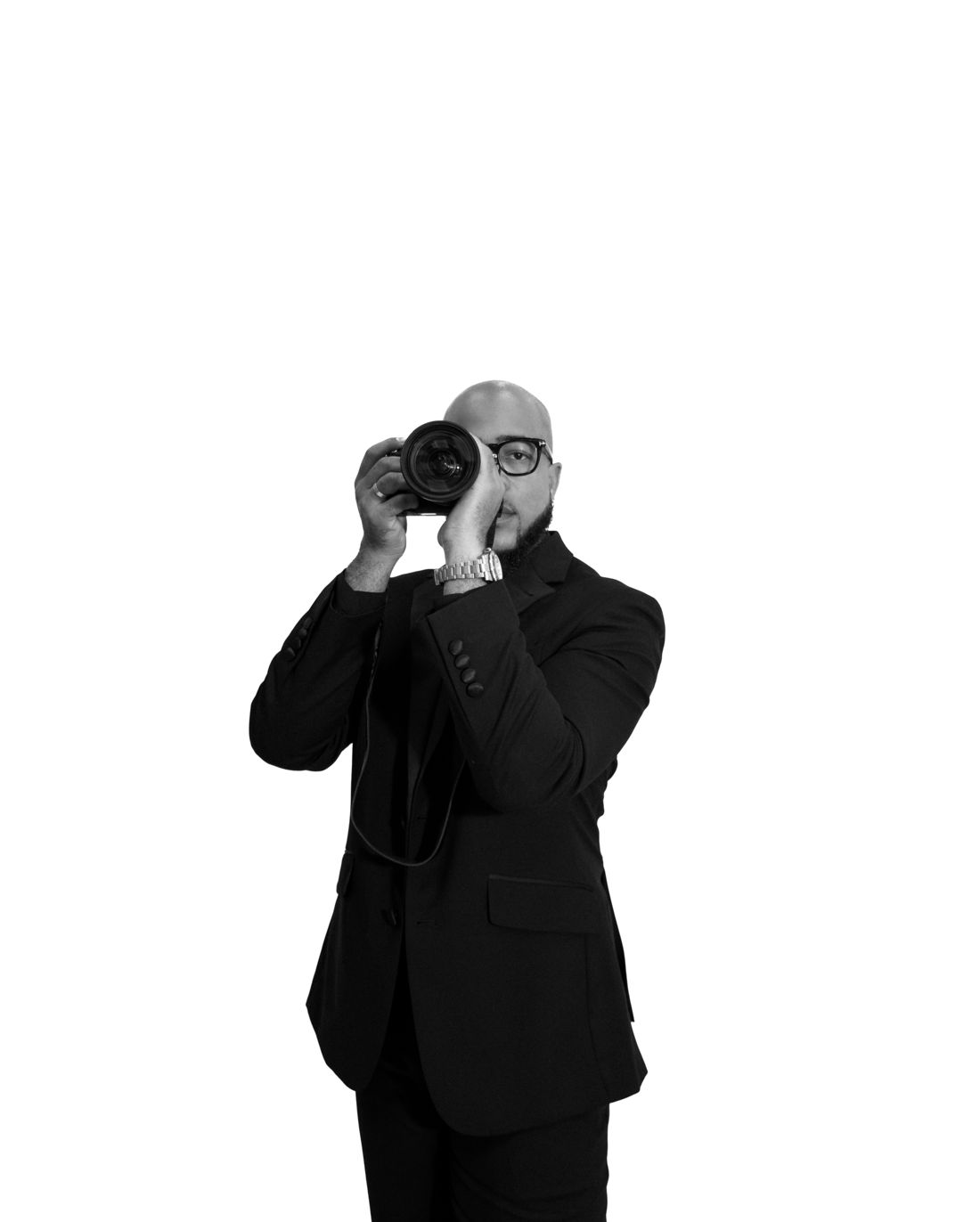 Dominic Henriques holding a camera